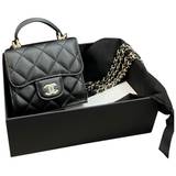 Chanel Timeless Classique Top Handle leather crossbody bag