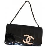 Chanel East West Chocolate Bar patent leather clutch bag