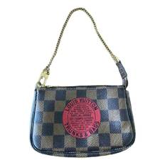 Louis Vuitton Pochette Trunk leather clutch bag