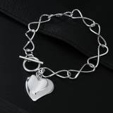 Trend Fine s925 Sterling Silver Double Heart Charms Armband för kvinnor Mode Fest Bröllop Accessoarer Smycken