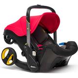Bakåtvända Babyskydd på rea Doona Infant Car Seat inklusive basfäste