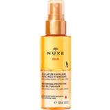 Nuxe Hårprodukter Nuxe SUN huile lactée capillaire protectrice hydratante 100 100ml