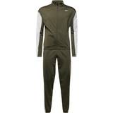Reebok Jumpsuits & Overaller Reebok Workout Ready Tricot Track Suit Night