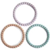 Lila Napphållare Mushie Pearl Teething Bracelet bitring Lilac/Cyan/Soft Peach 3 st