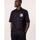 Versace T-shirts & Linnen Versace T-Shirt JEANS COUTURE Men colour Black