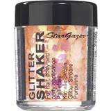 Stargazer Kroppsmakeup Stargazer tjock glitterskakare, UV orange. Kosmetisk glitter för användning på ögonen, läppar, ansikte, kropp, hår och naglar
