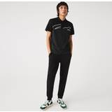 Lacoste Jumpsuits & Overaller Lacoste Träningsoveraller och träningsbyxor för män, Noir