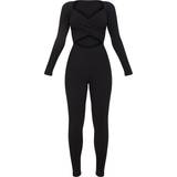 20 Jumpsuits & Overaller PrettyLittleThing Rib Cross Over Long Sleeve Jumpsuit - Black