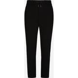 Dolce & Gabbana Byxor & Shorts Dolce & Gabbana Jersey jogging pants with DG patch