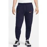 Sammet Kläder Nike Paris Saint-Germain Sweatpants NSW Tech Fleece Blå/Gold Suede Blå