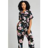 Blommiga Jumpsuits & Overaller Petite Belted Floral Print Jumpsuit in Black