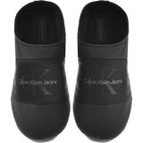 Calvin Klein Tofflor & Sandaler Calvin Klein Faux Leather Slippers BLACK