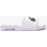 Lacoste Herr Tofflor & Sandaler Lacoste SERVE SLIDE DUAL 09221CMA white male Sandals & Slides now available at BSTN in