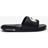 Lacoste Dam Tofflor & Sandaler Lacoste SERVE SLIDE DUAL 09221CMA black male Sandals & Slides now available at BSTN in