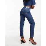 Calvin Klein Elastan/Lycra/Spandex Byxor & Shorts Calvin Klein Jeans – Mörktvättade mom jeans-Marinblå