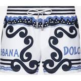 Dolce & Gabbana Badkläder Dolce & Gabbana Printed swim trunks blue