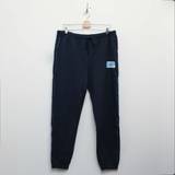 DKNY Byxor & Shorts DKNY Mens Jersey Cuffed Lounge Pant blått med märkt höfttryck, kontrasterande ben piping och Branded Draw Cord Ends lediga byxor herr, Navy