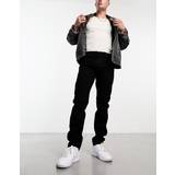 Abercrombie & Fitch Byxor & Shorts Abercrombie & Fitch – Svarta smala jeans i90-talsstil-Svart/a