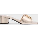 Givenchy Skor Givenchy 4G gold leather mules