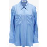 Dam - Halterneck Blusar Dorothee Schumacher Silk blouse with pockets