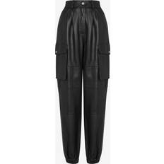 Moschino Dam Byxor & Shorts Moschino Womens Black Patch-pocket Tapered-leg Mid-rise Leather Trousers