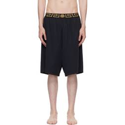 Versace Long surf shorts with Greca trim a80g_black_gold_greek_key